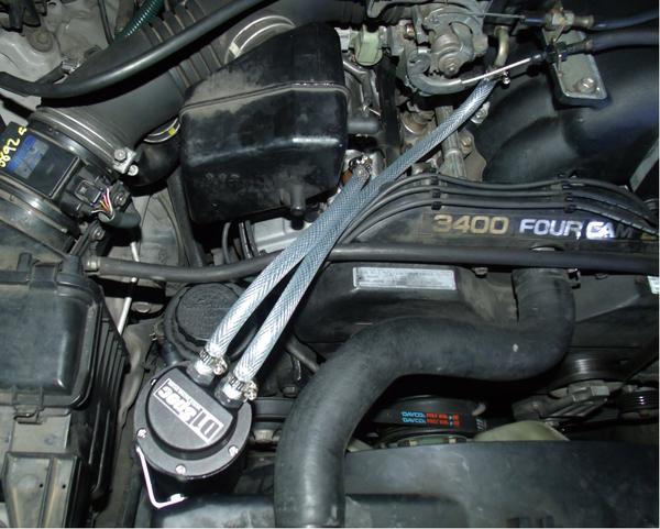 Catch can, redirects oil and residue into the can where it settles and out of the intake.