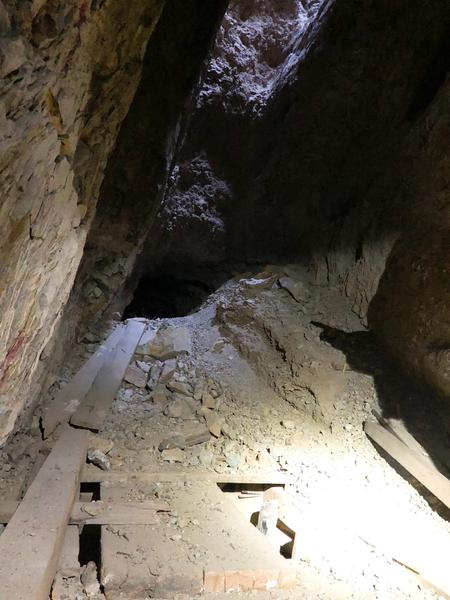 Cave in.