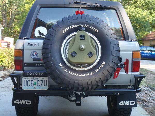 CBI off road tire carrier, 2nd gen. 4Runner license plate mounted to bumper, Daystar Cam can gas can, third brake light