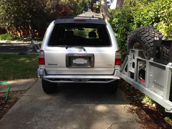 Cbi rear hybrid bumper with tire carrier open
