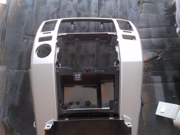 Center dash trim piece out for a repaint.