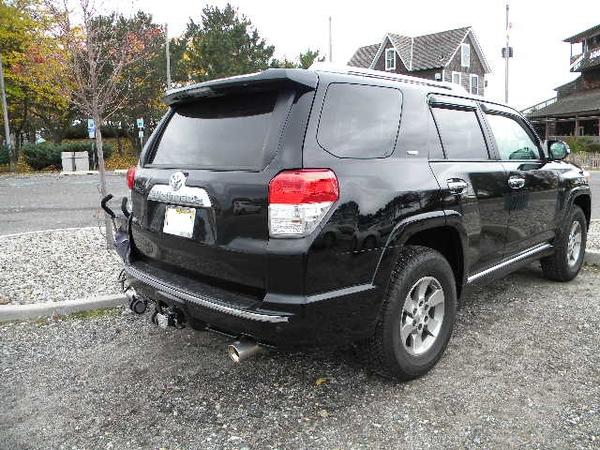 Chrome hitch cover and exhaust cover.