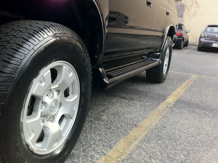 Cleaned out rust on rocker panels & installed OEM Running boards painted 202 black.