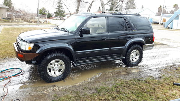 Cleaned up with the new tires and headlights in.