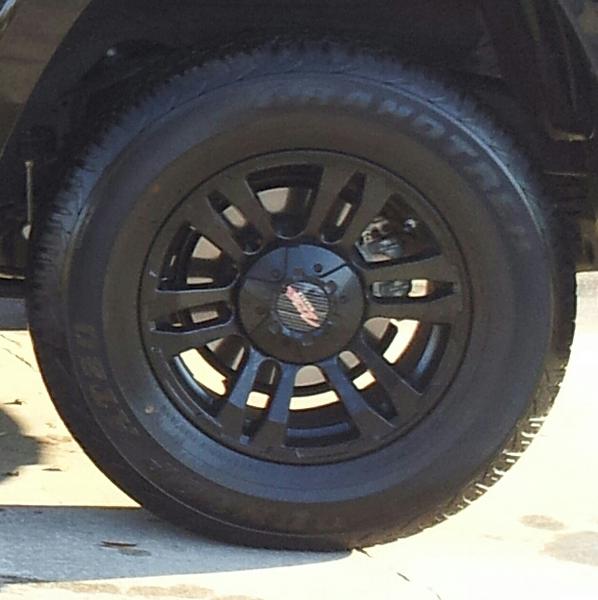 Close up of the tires and rims that are FOR SALE