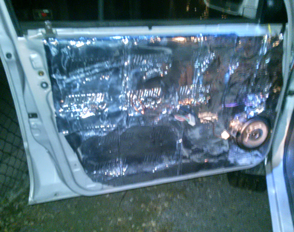 covered my door in sound dampening material yesterday, the pitcher does not look that good cuz i was doing it in the dark but got the front doors done