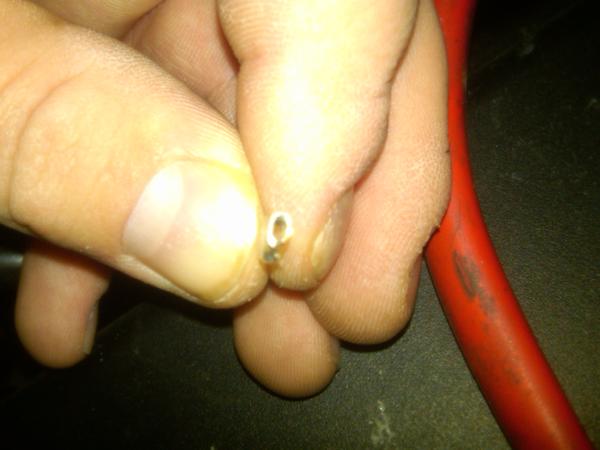 Crimped spayed connector to fit on the post. Work in increments, making sure the connector is TIGHT on the post