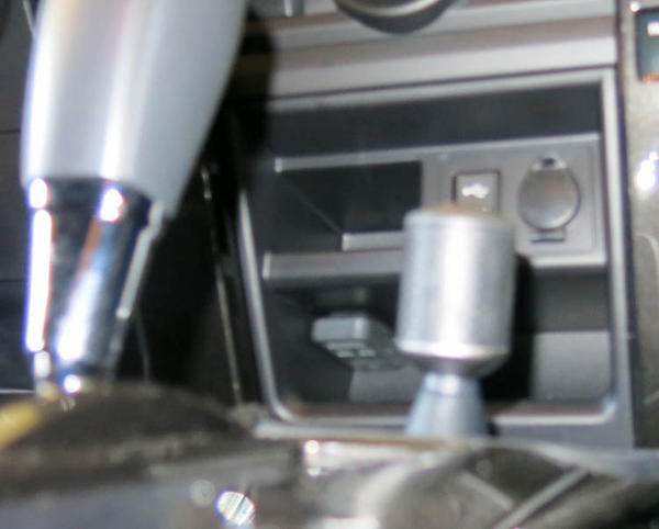Cubby slot mount, you'd never know its there unless you are looking for it.