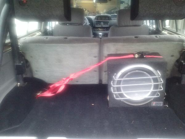 Custom mounted 6x9's in boxes on the roll bar