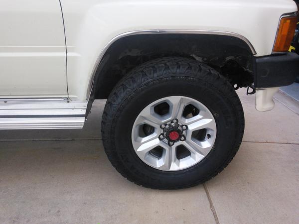 Cut the running board for some extra clearance. About 5/8" on top and closer to 1-1/2" at the bottom.