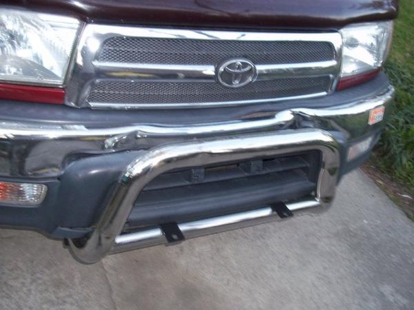 damaged front bumper and custom grill inserts