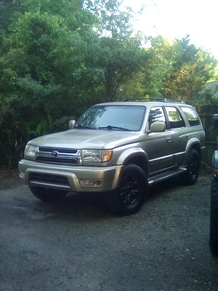 Day I bought it. Totally stock except previous owner painted the rims black. Had 116000 miles on it.