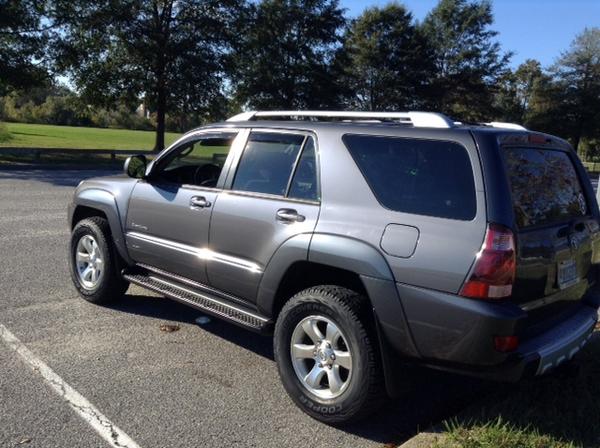 Daystar 1" Budget Boost Leveling Kit, All-Pro 1.5" spacer, Cooper Discoverer AT3 tires. [Back Angle]