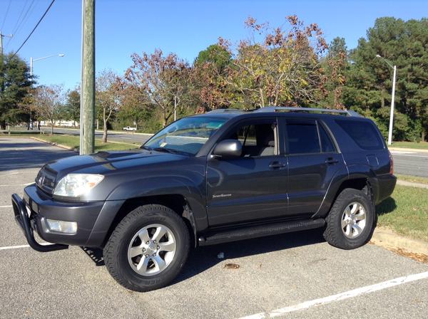 Daystar 1" Budget Boost Leveling Kit, All-Pro 1.5" spacer, Cooper Discoverer AT3 tires. [Front Angle]