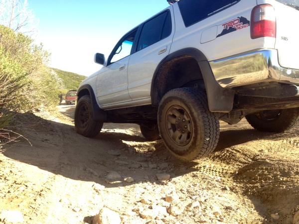 Dealing with the huge ruts everywhere.. Yes my tire is not touching the ground.