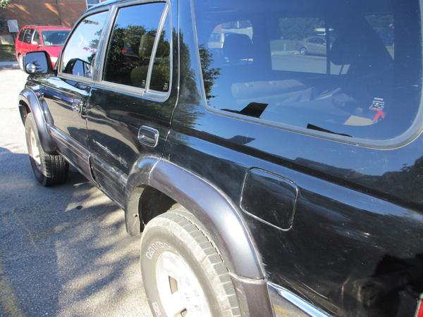 Debadged, sporting some war wounds from the trails