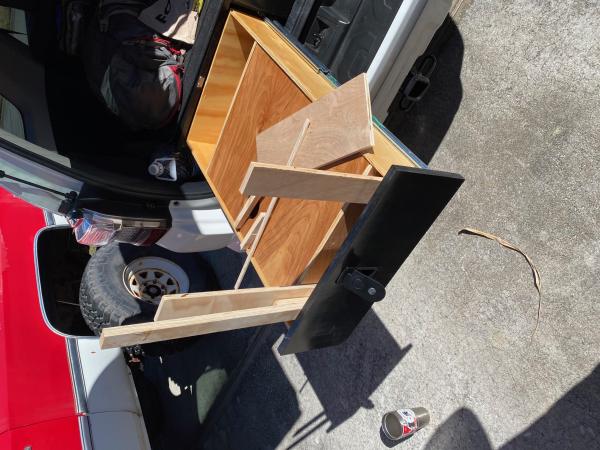 Decided to added a 'coffee table' spring pop up to one drawer.  Because of the compression locks, I had to space the pop up to give it clearance, and 