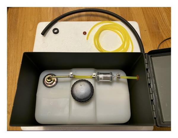 Diesel tank inside Fat 50 mmo can. Standpipe on left connects to fuel filter inside the ammo can. The fuel line from the fuel filter then runs under t