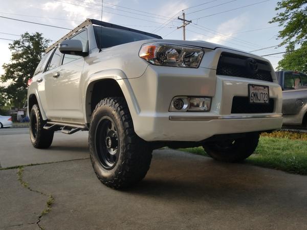 Different angle of the front bumper and a look at my modified nfab steps.