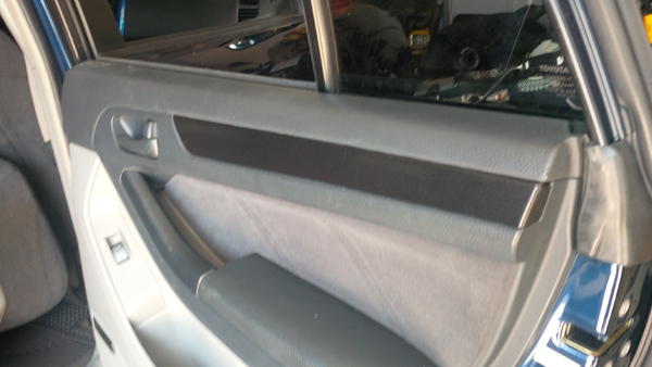 Door trim wrapped in Black Brushed Steel