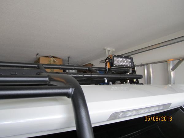 Double row 7.5 in LED light bar as my back up light. Someone had to put limo tint over the factory tint... : )