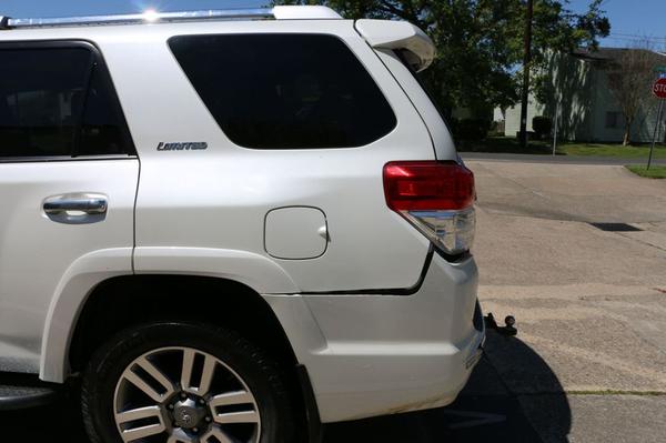 Driver side rear, small damage to bumper cover only, one bolting eye torn, small crack in lower bumper (out of view here).