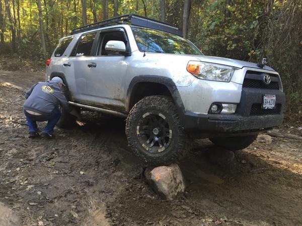 Failed attempt at extracting the branch, which was stuck between the shock absorber and frame.
