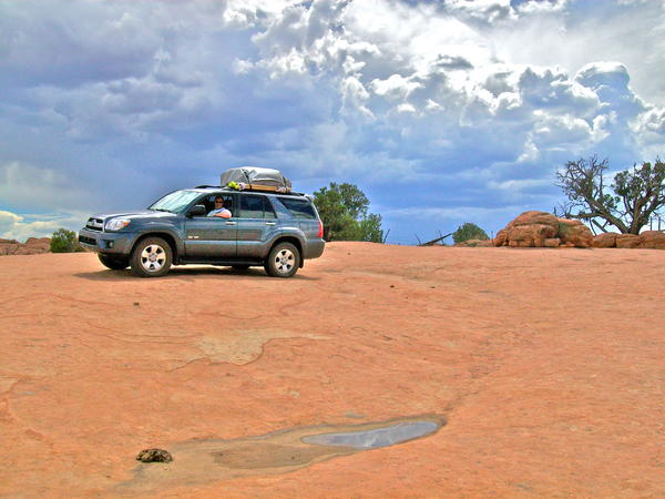 Family trip '08:  Bone stock and fully loaded.  Bureau of Land Management, Arizona desert, no roads, no GPS, rain clouds looming.