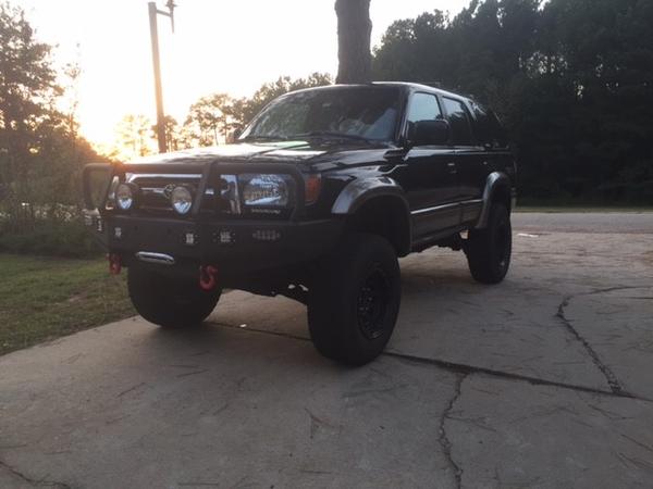 Finally put a 4" suspension lift on and a modified ARB Bumper.