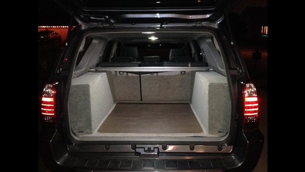 Finished product! Completely covered in carpeting, including the interior. I notched out a squre off the bottom piece in the back for the cargo net at