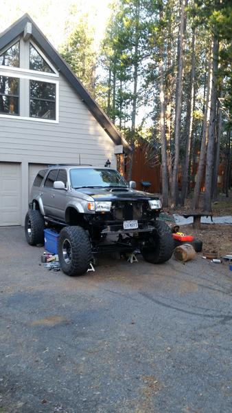 First picture after getting the 60 under. I did this in my driveway and had to take the grill off to get my high lift close enough to lift the front e