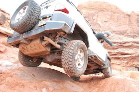 FJ showing off the Man-A-Fre Aux tank, aka best thing to put on a FJ.