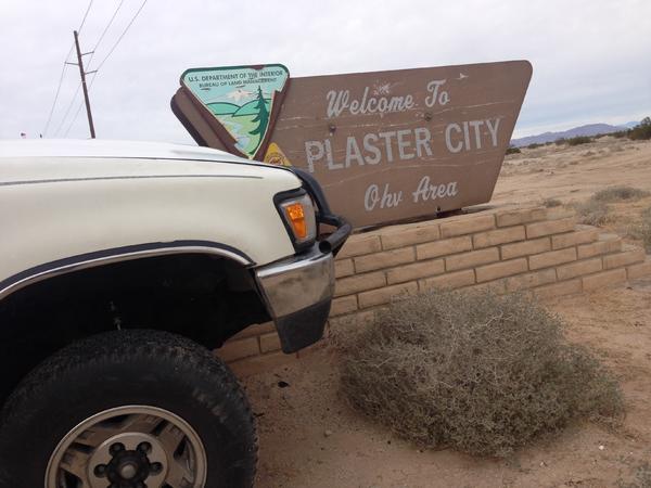 flex on the plaster city sign in CA