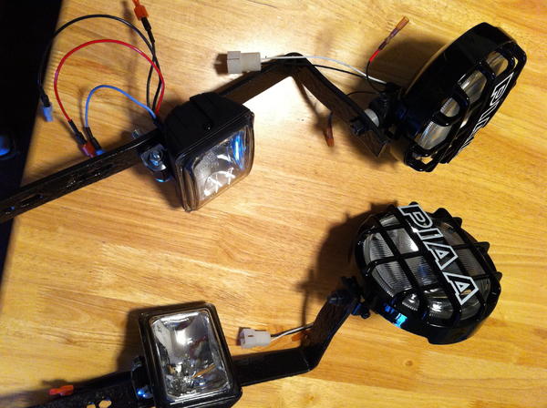 Floating Piaa 520 ATP and Hella Micro FF, Put 100w bulbs in the Hellas first thing.
Also added a clear 3m type film coating on all the lights for a li