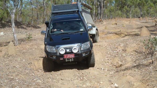 Friends Hilux pulling the Camp Kitchen - Had hot water, Stereo, washing up tubs, stove, lights, fridge ... basically I had to bring nothing but food.