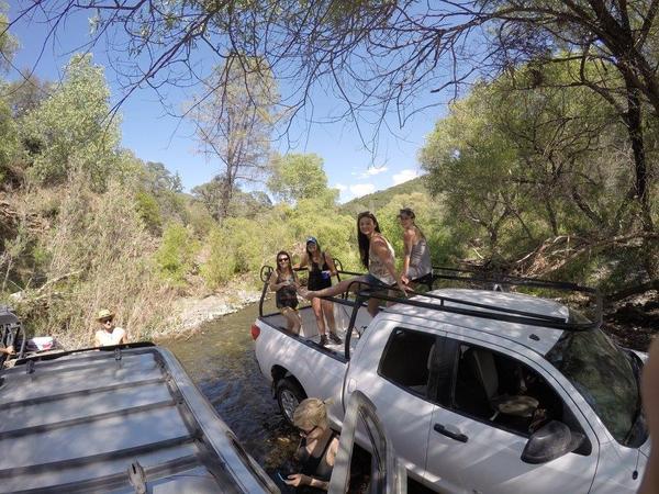 From the rooftop, looking at good friends during a good time at the swimming hole.
