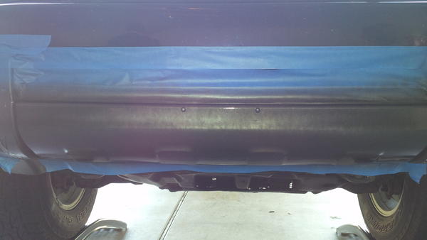 Front bumper trim getting sprayed
