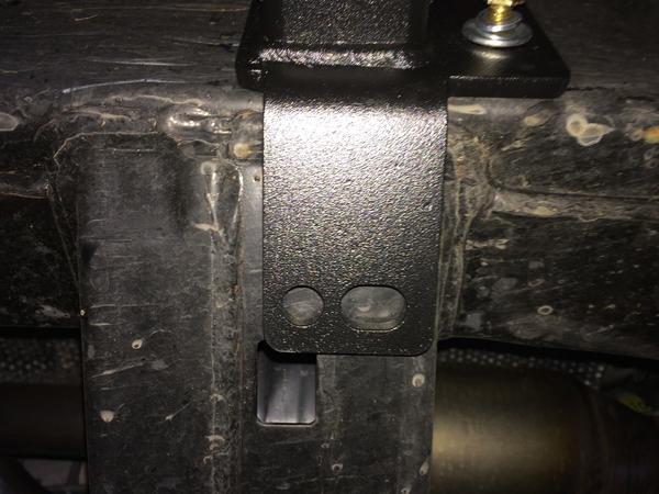 Front passenger side.  No hole for mount.