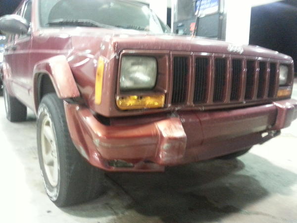 Front view. Doesn't look bad from the pictures, but his hood, quarter panel, bumper, and sub-frame are all damaged, along with a busted radiator, brok