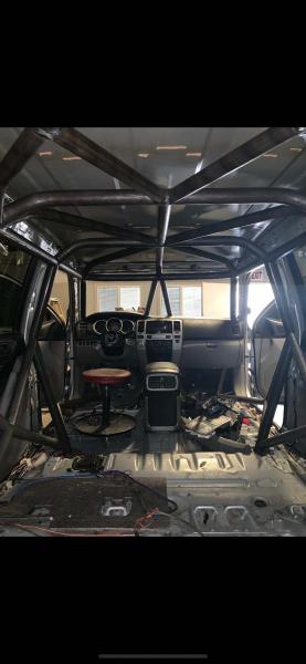 full cage done minus harness bar and seats mounted
