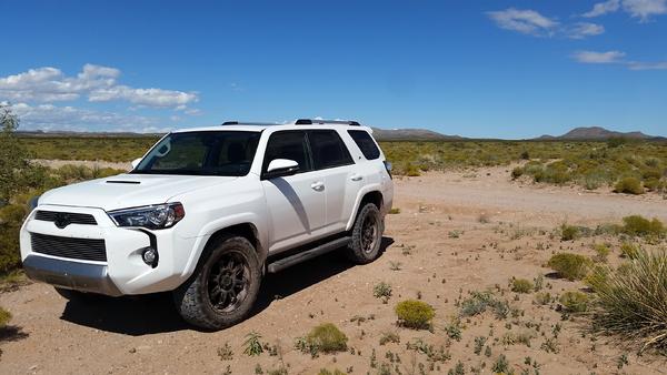 Getting happily dusty in New Mexico backcountry.