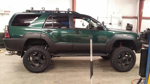 Getting her new shoes on.