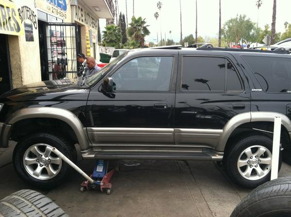 Getting the 17" 08 4Runner Sport Rims put on.