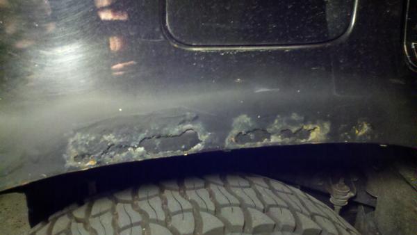 Going to grind this more and then apply fiberglass mat & resin. Passenger side rear well.