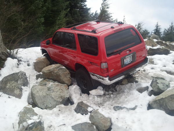 got high centered on transfer-case cross member,  over  huge rock.
lucky for my doors i had rock sliders!!