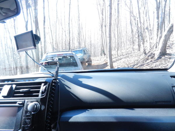 Got to the top of the muddy, slick, twisting trail up the hill in the woods and a jeep makes us turnaround and go back down...