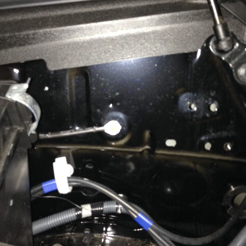 Ground Passenger Side (there was a screw whole already drilled by factory in the body, used screw that came with ballast kit since I'm not using it ri