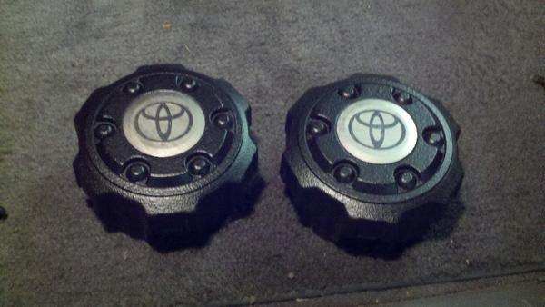 Had some leftover undercoating...decided to apply it to the faded center caps for my wheels.