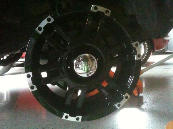 here is a pic of the 18X9 ULTRA WHEEL THUNDER WHEEL with a 12mm offset... forgot to take a pic of the tires... they are 285/65r18 NITTO TERRA GRAPPLER