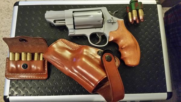 Here is my whole ensemble for my Governor; hogue wood grips, Galco Holster and ammo carrier, 5 Star Speed loader (zombie green).